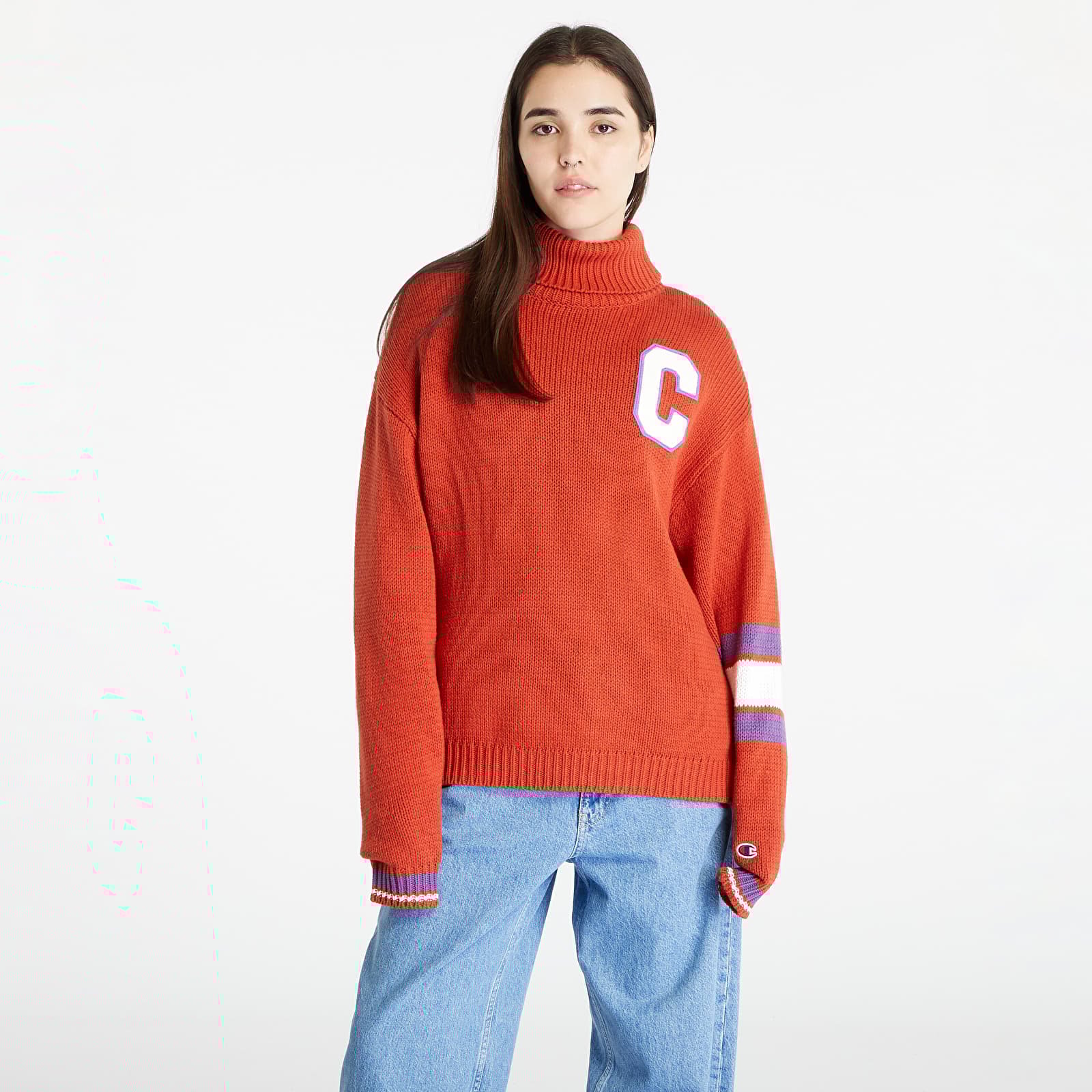 Champion sweater 2025 material crossword