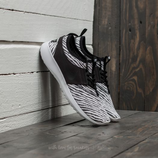 Women s shoes Nike W Juvenate SE Black Black White Footshop