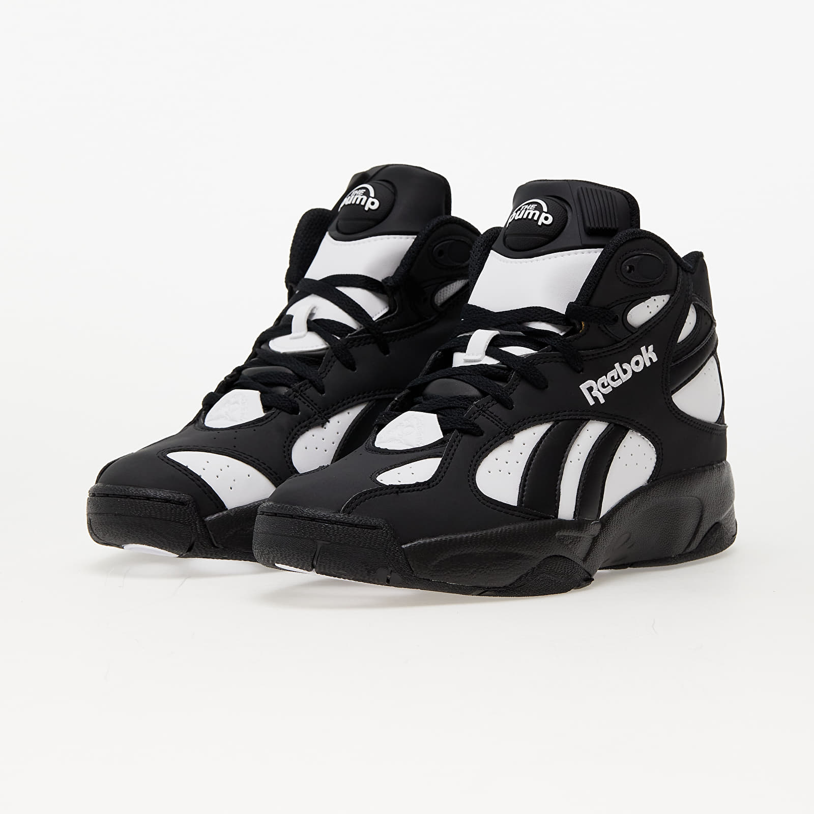 Black and white best sale reebok pumps