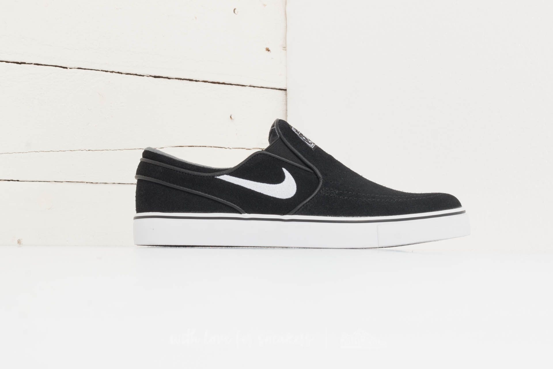 Janoski slip on black store white