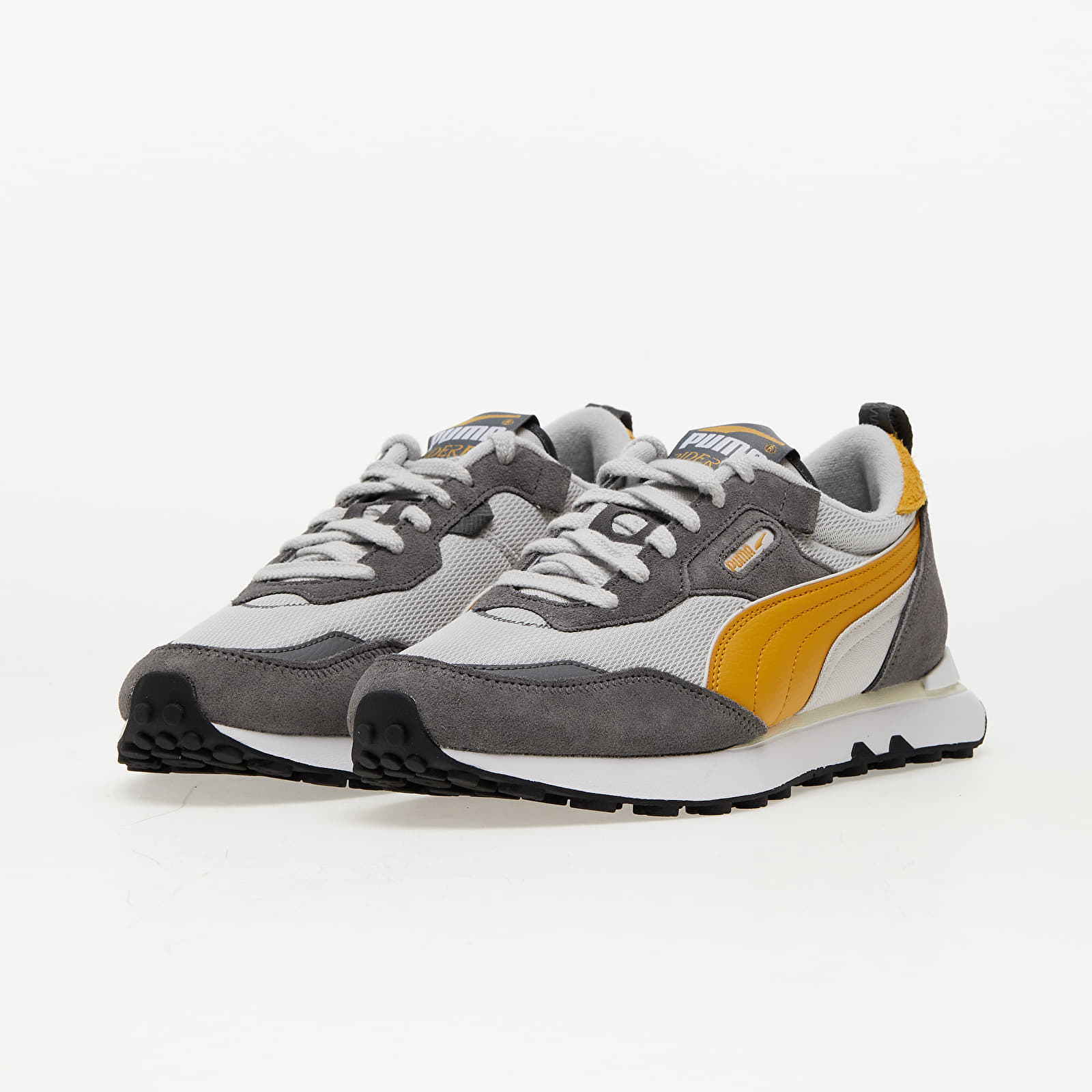 Grey and yellow pumas 2025