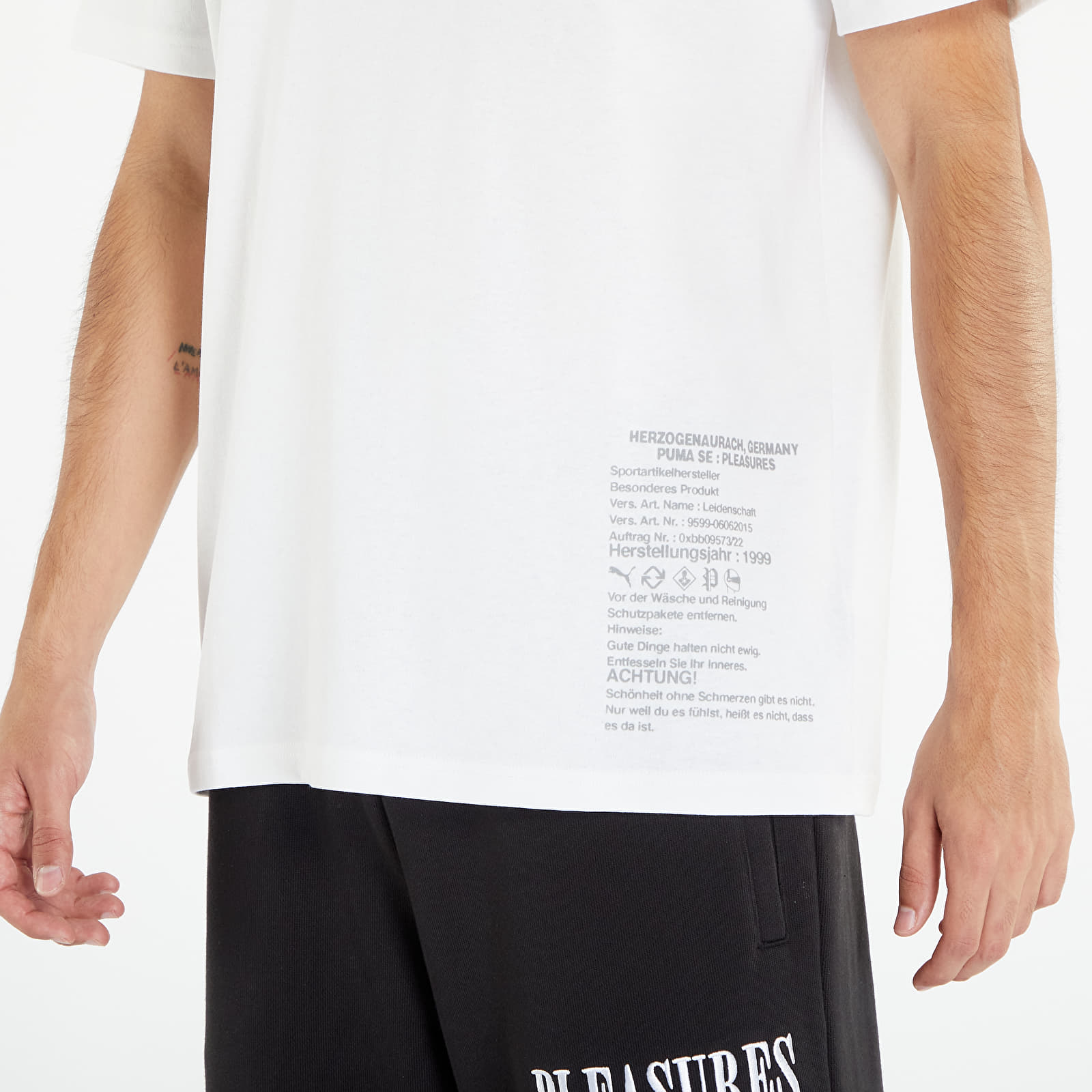 Pólók Puma x PLEASURES Typo Short Sleeve Tee White