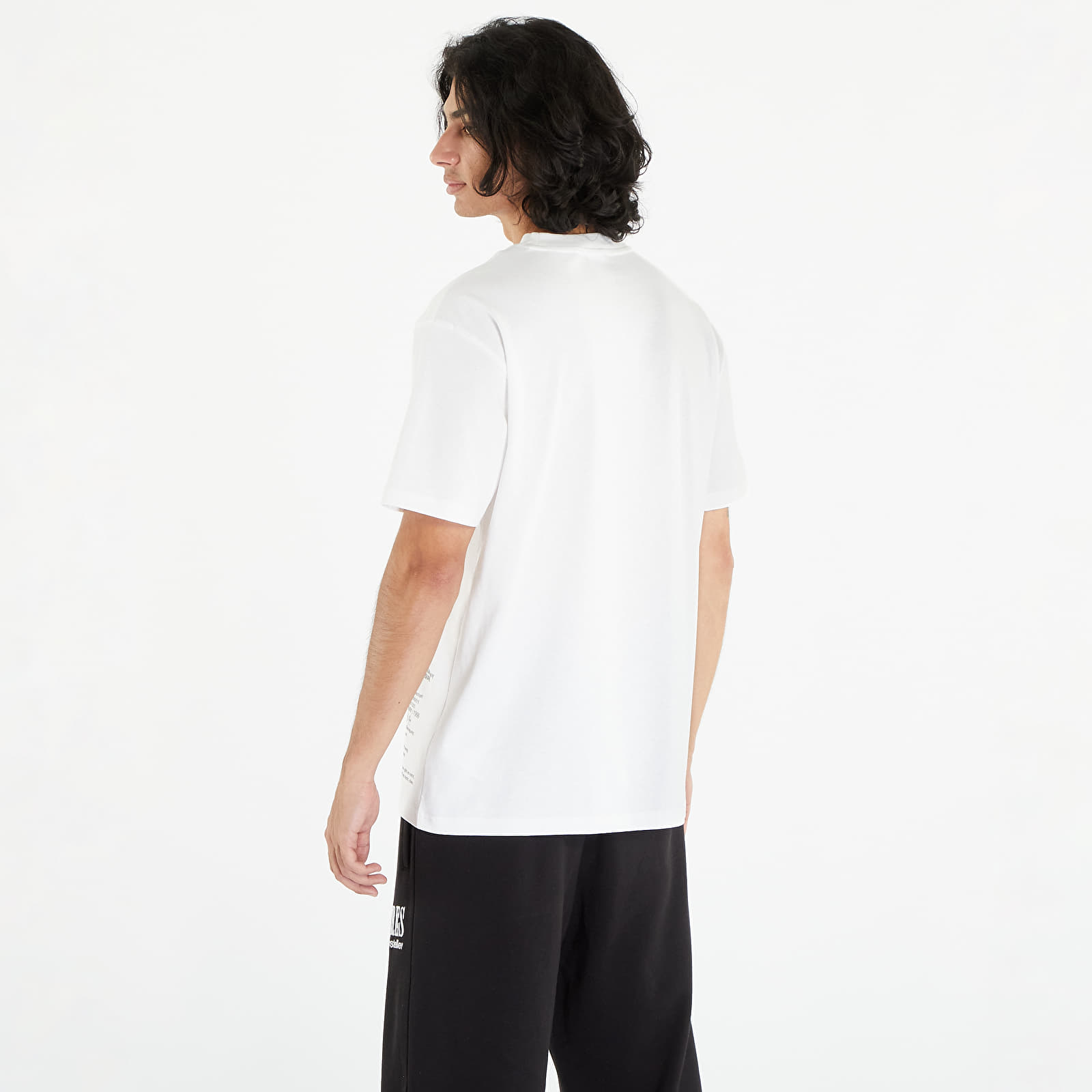 Pólók Puma x PLEASURES Typo Short Sleeve Tee White