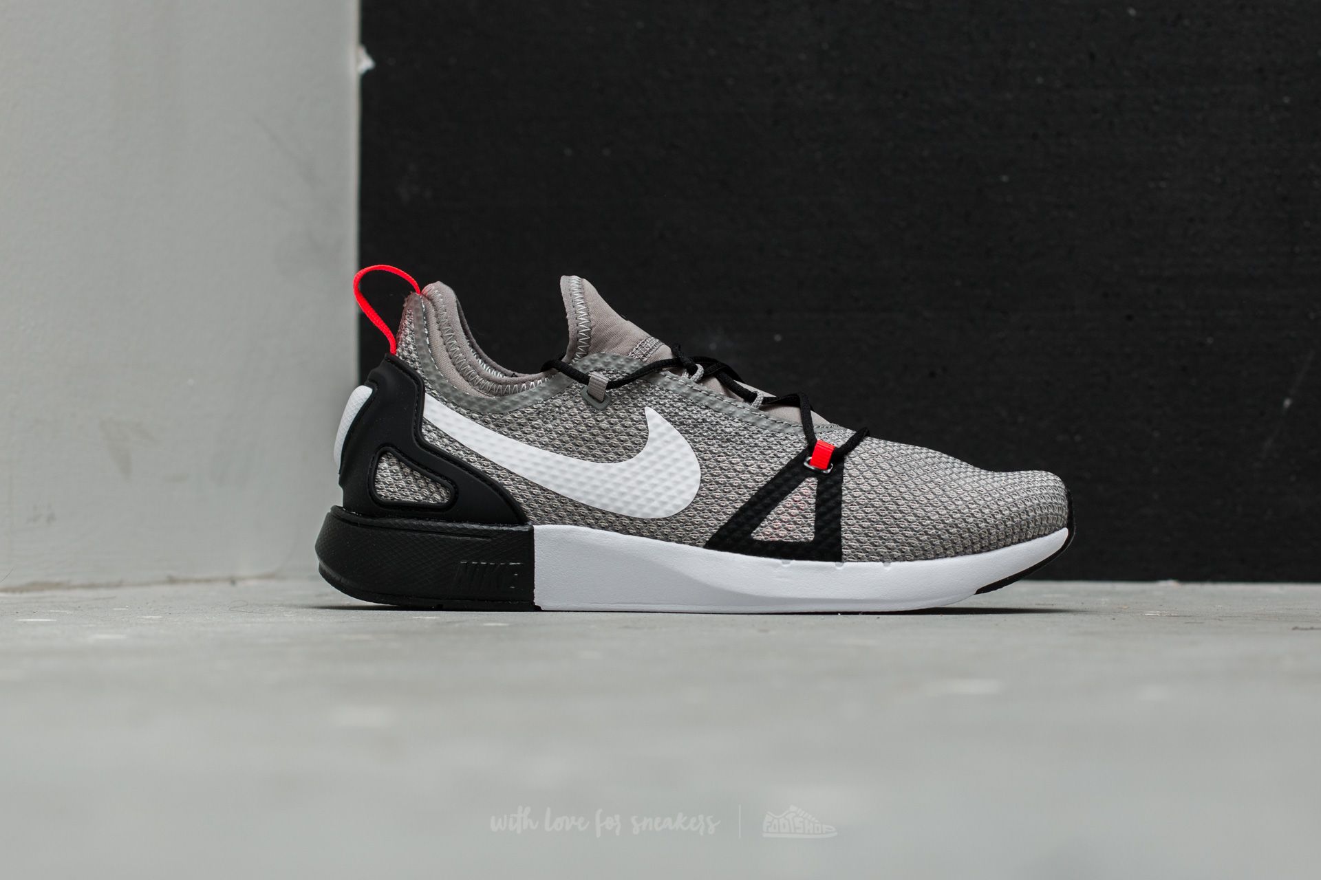 Women s shoes Nike Duel Racer GS Light Charcoal White Pale Grey Footshop