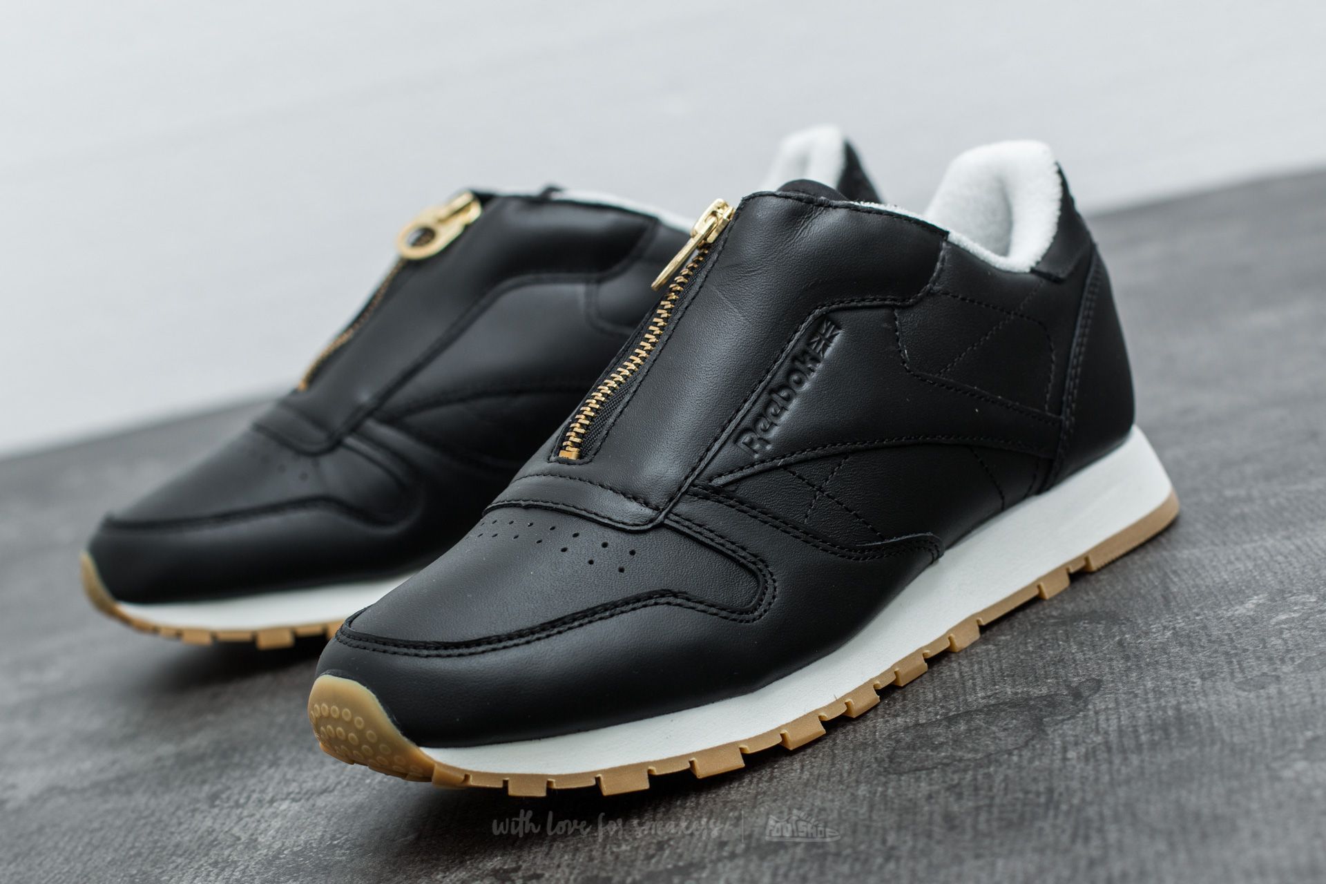 Reebok leather zip on sale