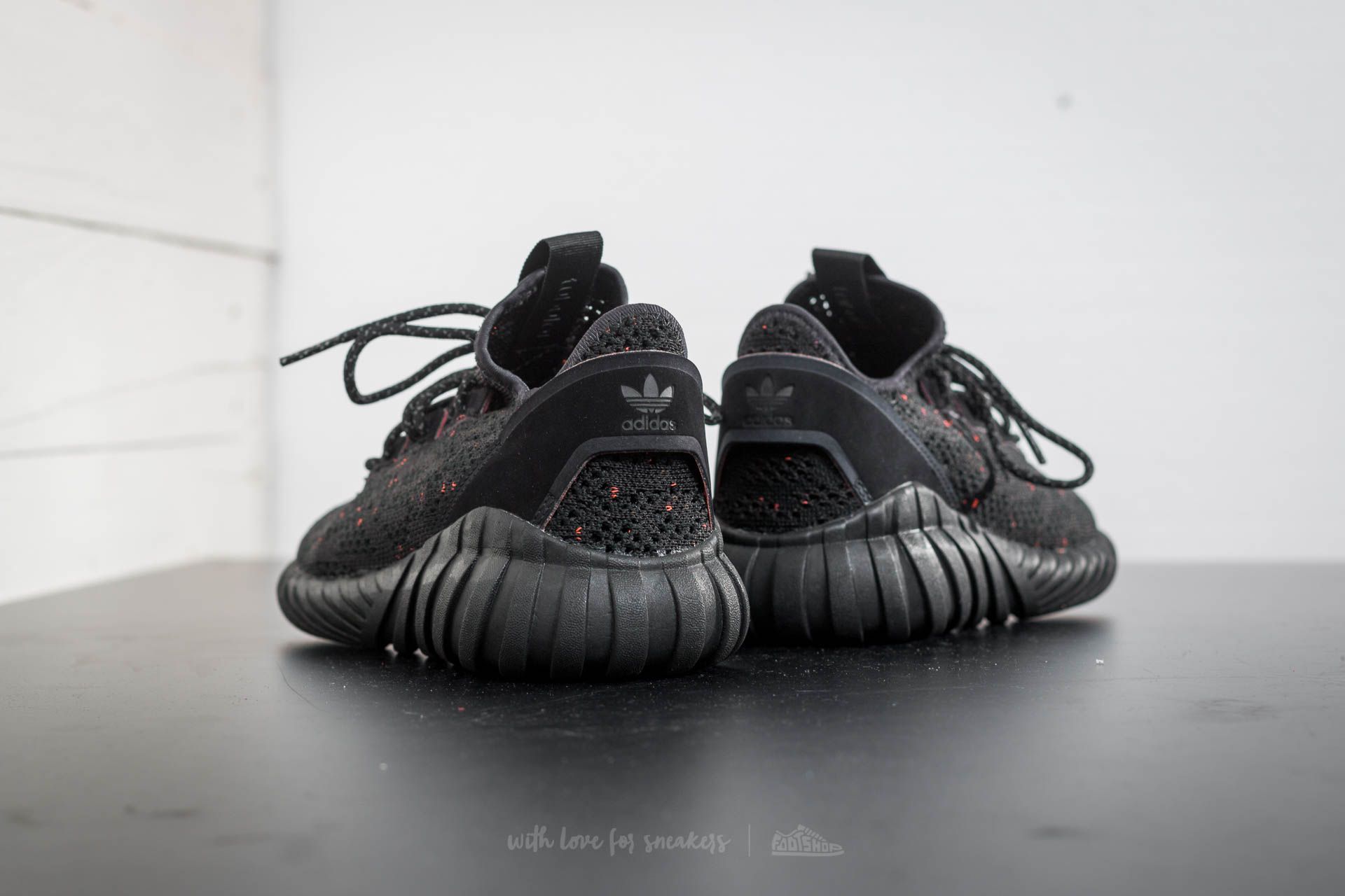 Women s shoes adidas Tubular Doom Sock Primeknit J Core Black Core Black Trace Olive Footshop