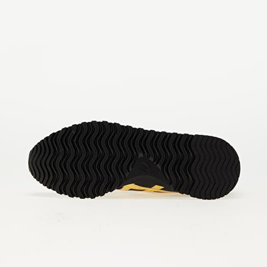Black and gold asics tigers deals