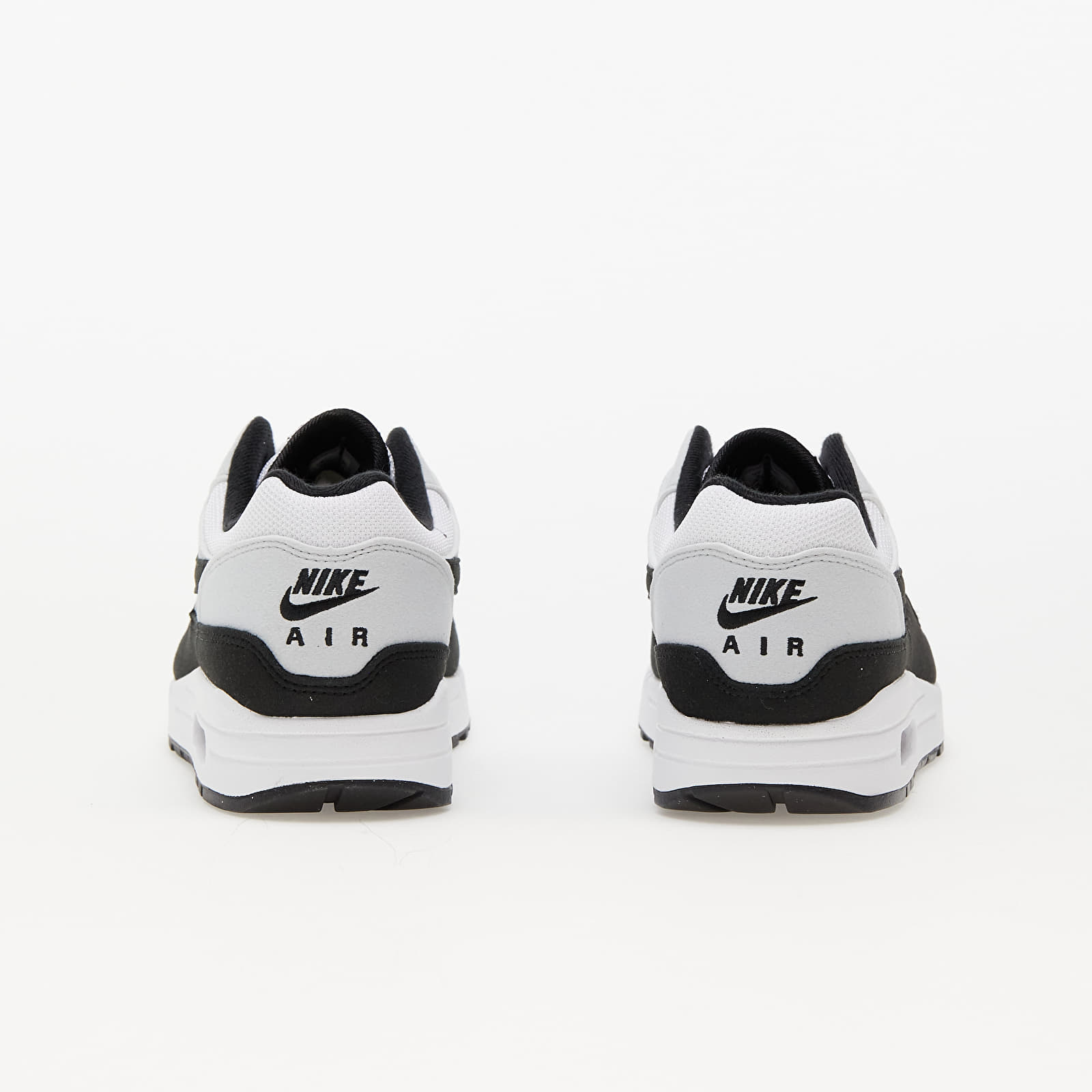 Nike white sneakers black logo clearance