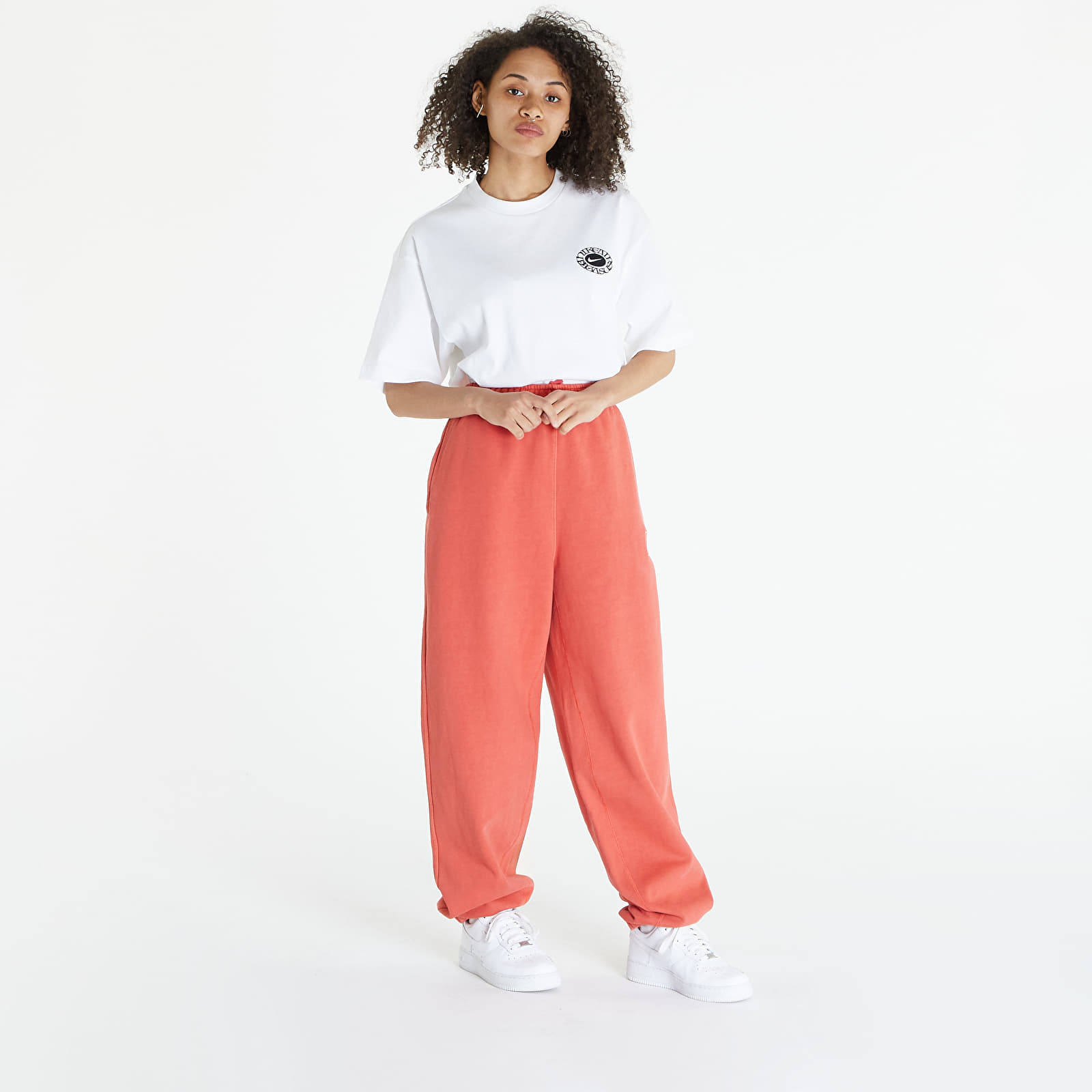 Pantaloni della tuta  Nike U NRG x Stüssy Fleece Pants Habanero Red/ Natural