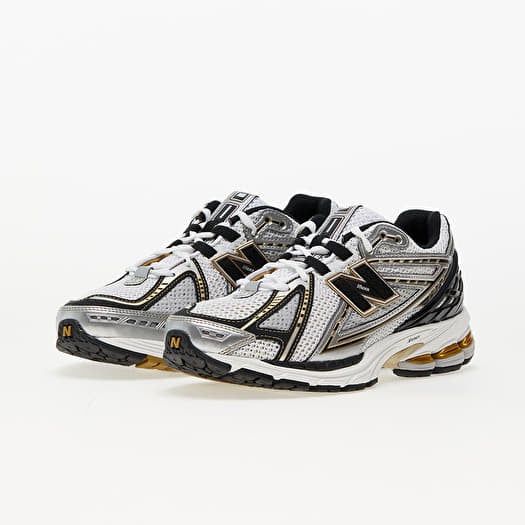 Silver and gold sneakers top