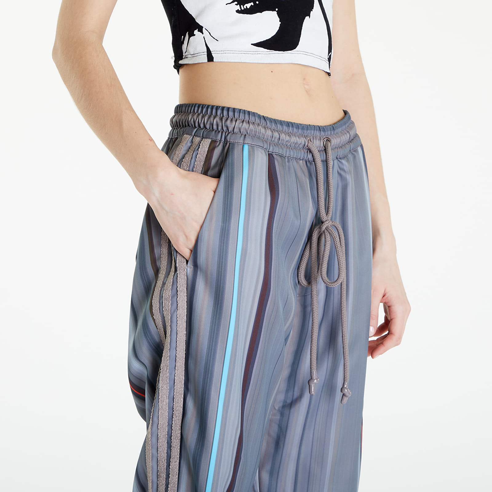 Džíny a kalhoty adidas x Song For The Mute Allover Print Pants UNISEX Brown