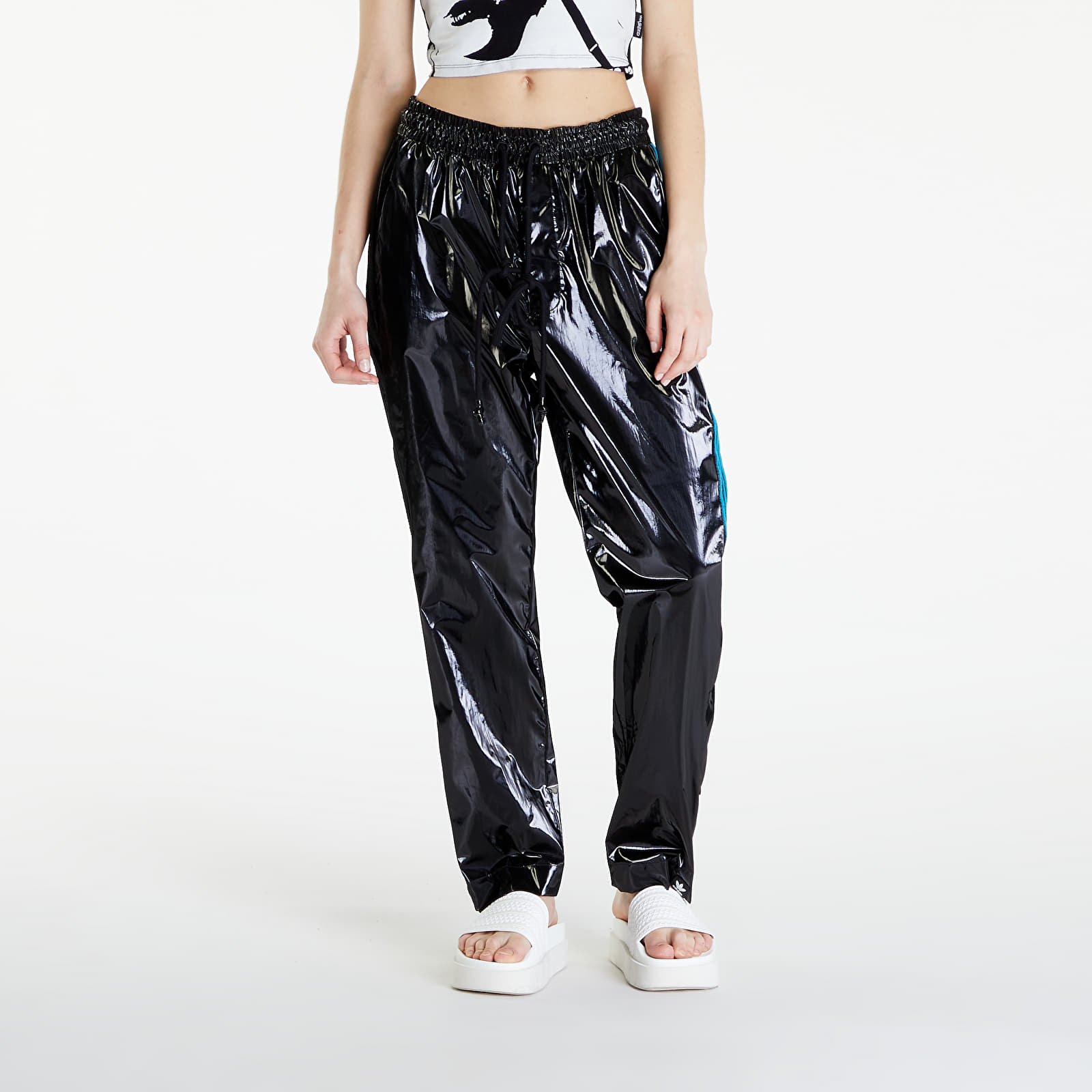 Džíny a kalhoty adidas x Song For The Mute Shiny Pants UNISEX Black/ Active Teal