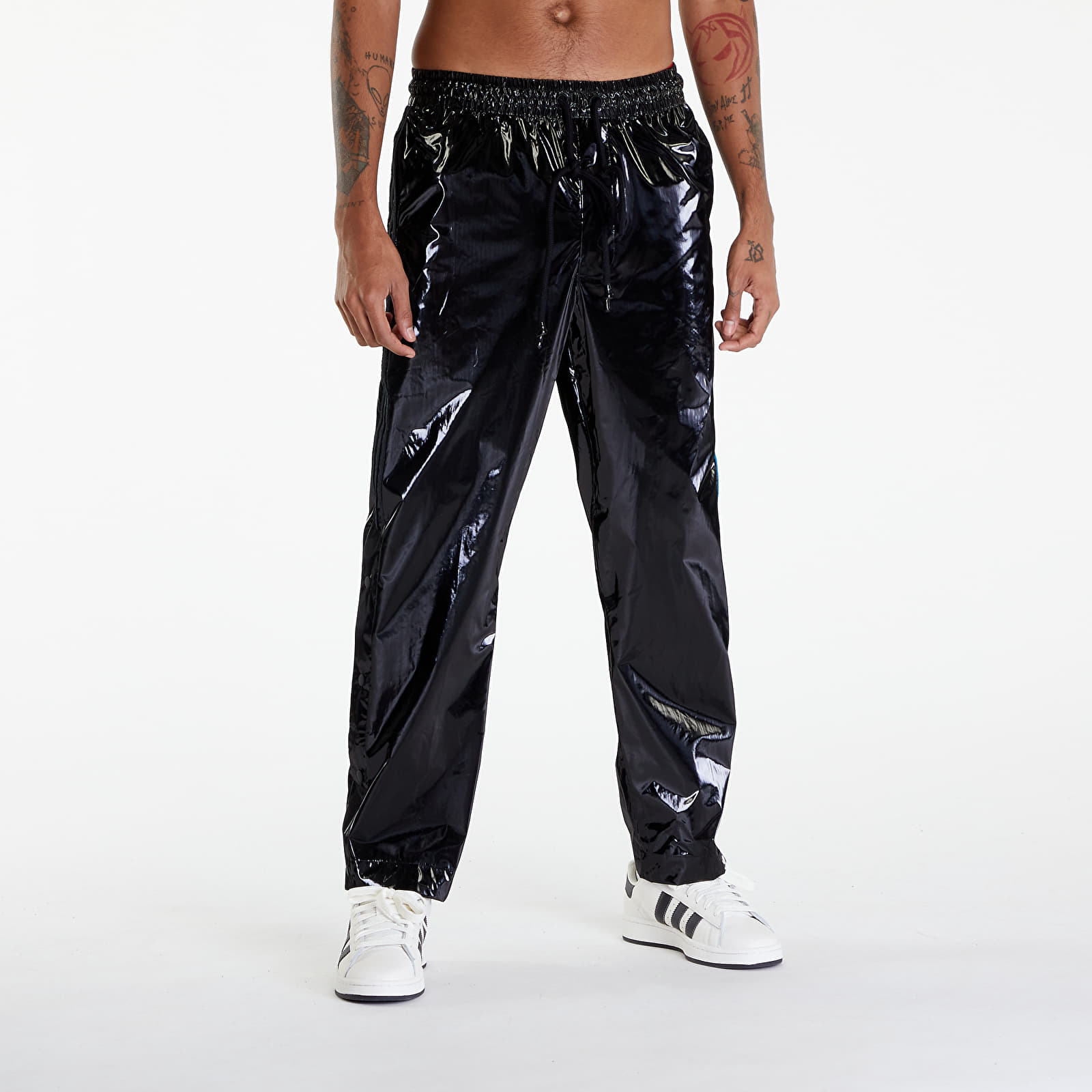 Džíny a kalhoty adidas x Song For The Mute Shiny Pants UNISEX Black/ Active Teal