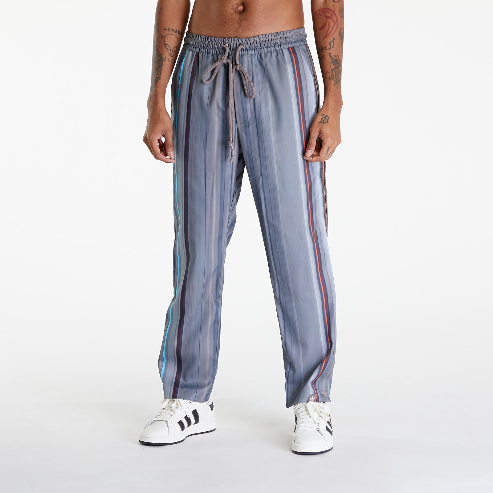 Džíny a kalhoty adidas x Song For The Mute Allover Print Pants UNISEX Brown