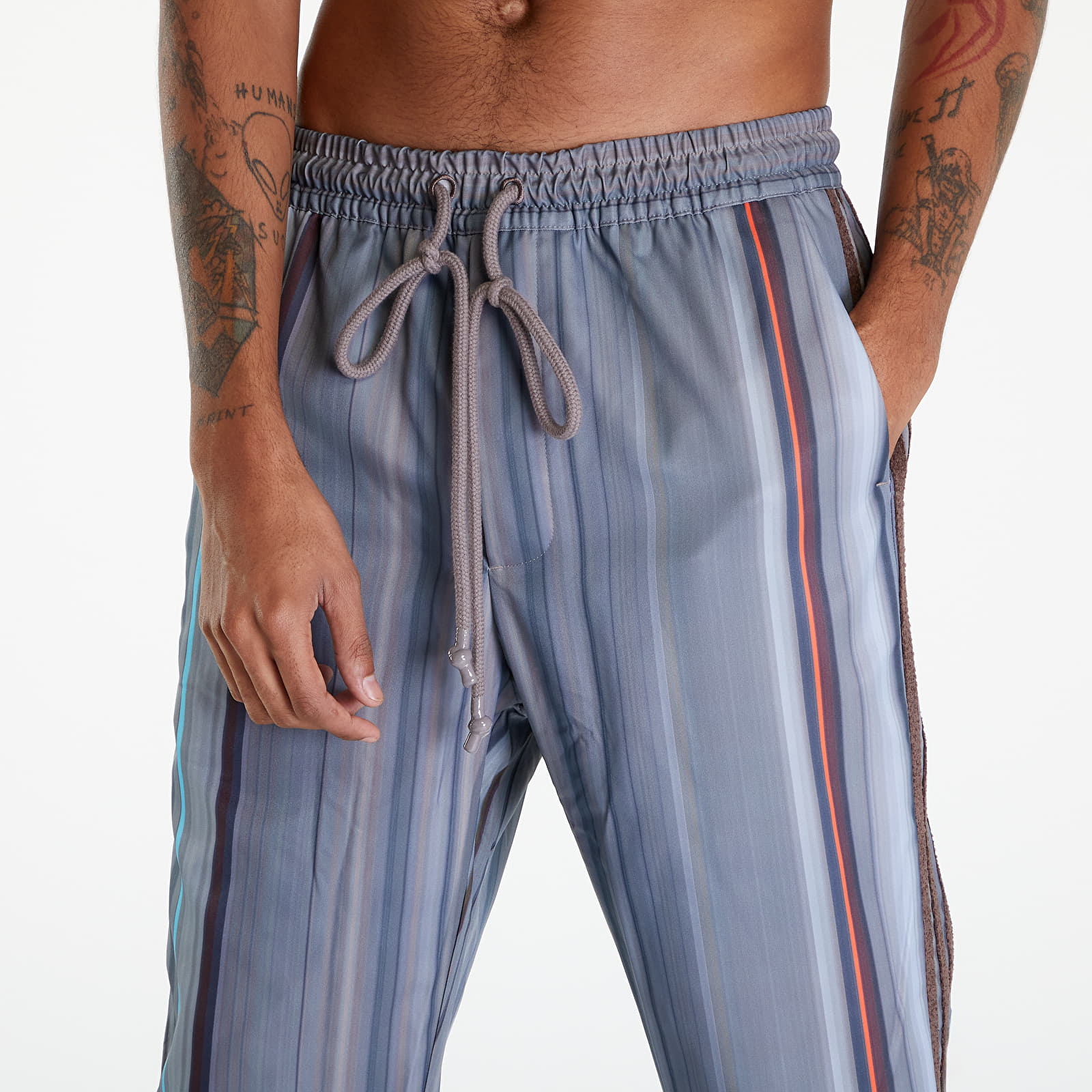 Džíny a kalhoty adidas x Song For The Mute Allover Print Pants UNISEX Brown