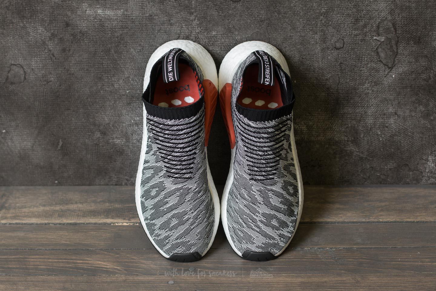 Adidas originals mens nmd_cs2 sale primeknit trainers schwarz/schwarz/future harvest