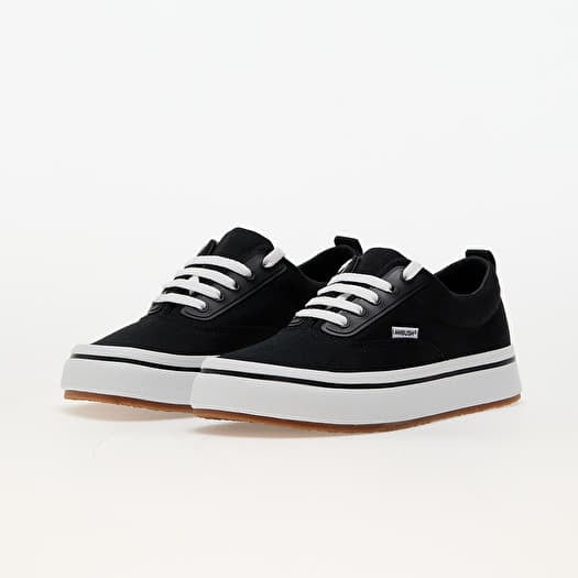 Vans vulcanized black white best sale