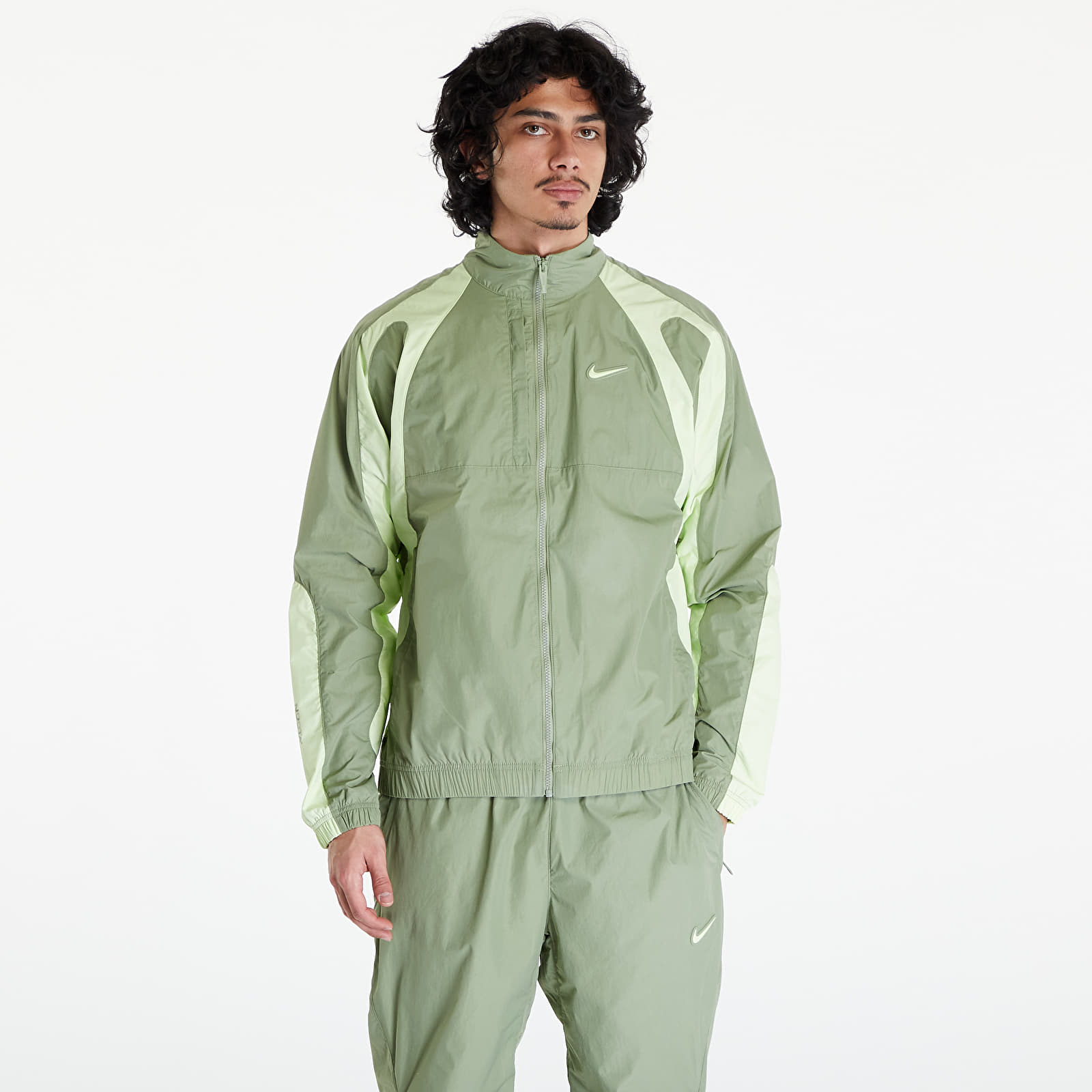 Dzsekik Nike x NOCTA Men's Woven Track Jacket Oil Green/ Lt Liquid Lime/ Lt Liquid Lime