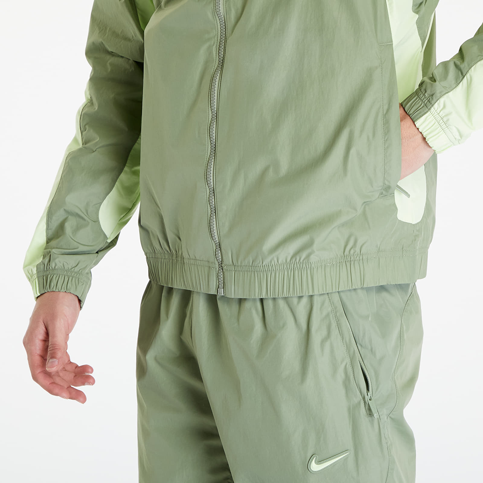 Dzsekik Nike x NOCTA Men's Woven Track Jacket Oil Green/ Lt Liquid Lime/ Lt Liquid Lime