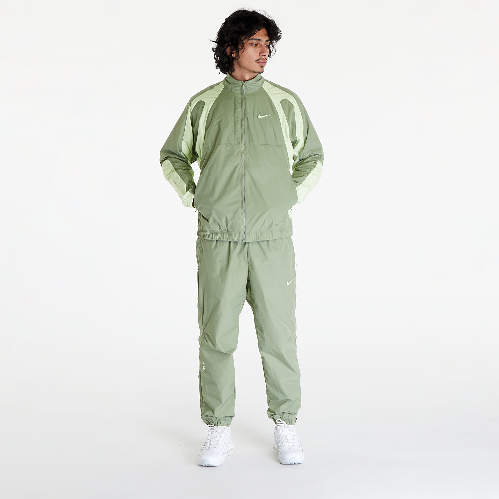 Dzsekik Nike x NOCTA Men's Woven Track Jacket Oil Green/ Lt Liquid Lime/ Lt Liquid Lime