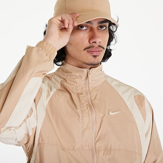 Jackets Nike x NOCTA Men s Woven Track Jacket Hemp Sanddrift Sanddrift Footshop