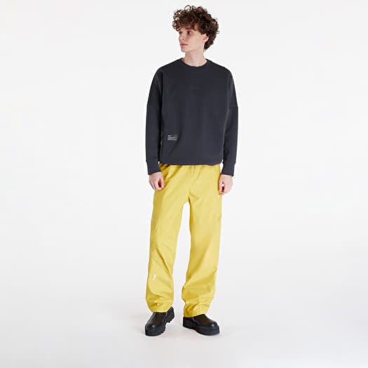 Pantalons Nike x NOCTA x L ART DE L AUTOMOBILE Men s Tech Pants Vivid Sulfur Sail Footshop
