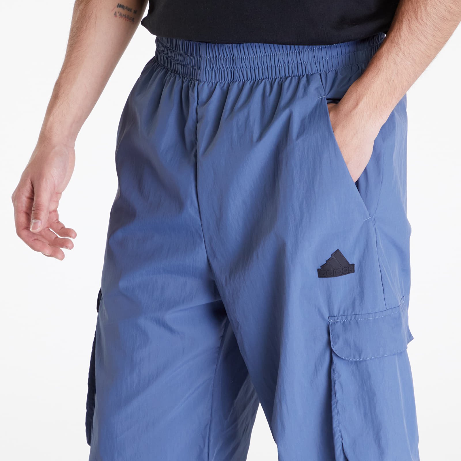 Pants and jeans adidas City Escape Q2 Cargo Pant Preloved Ink