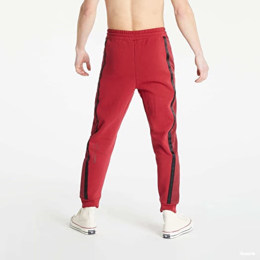 Pants and jeans Jordan 23 Engineered Men s Fleece Pants Pomegranate Footshop