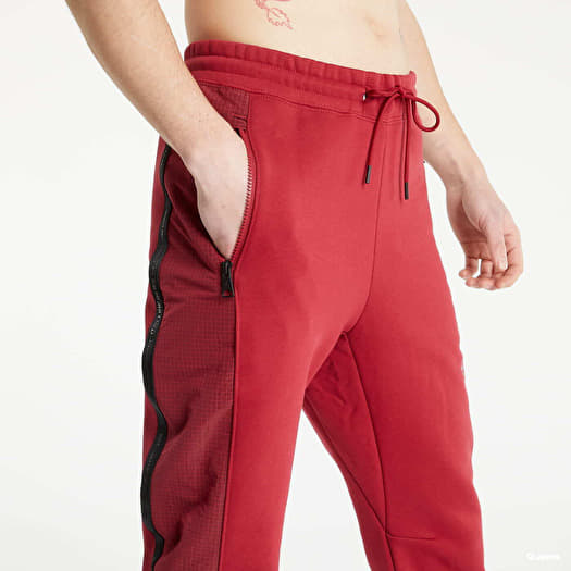 Pants and jeans Jordan 23 Engineered Men s Fleece Pants Pomegranate Footshop