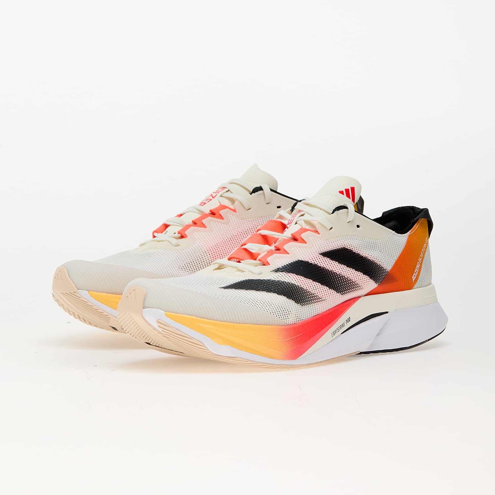Scarpe uomo adidas Adizero Boston 12 M Ivory/ Core Black/ Solid Red