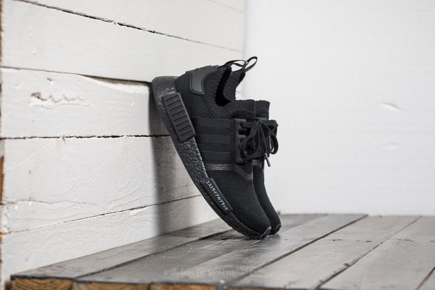 Men s shoes adidas NMD R1 Primeknit Core Black Core Black Core Black Footshop