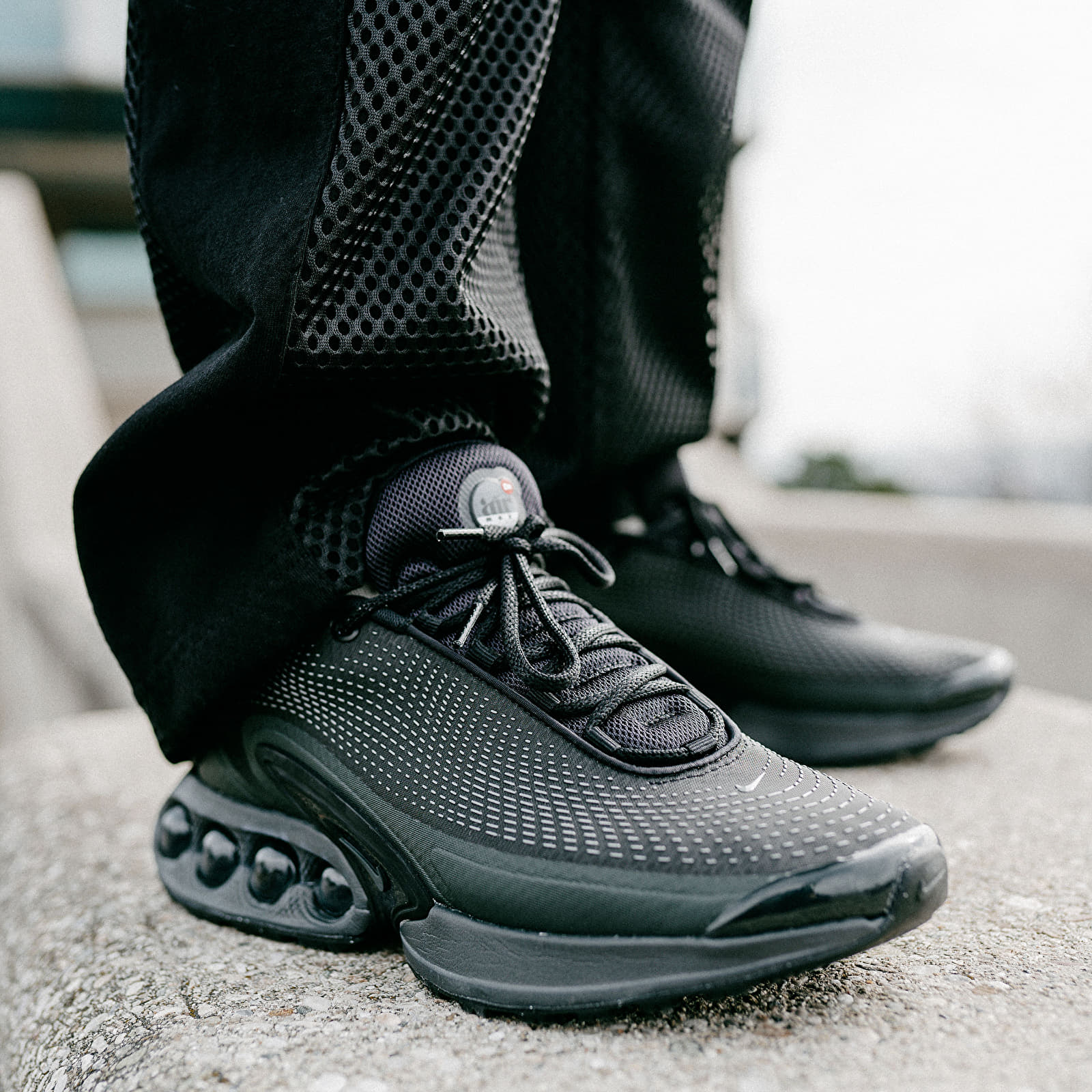 Grey and black nike sneakers shop