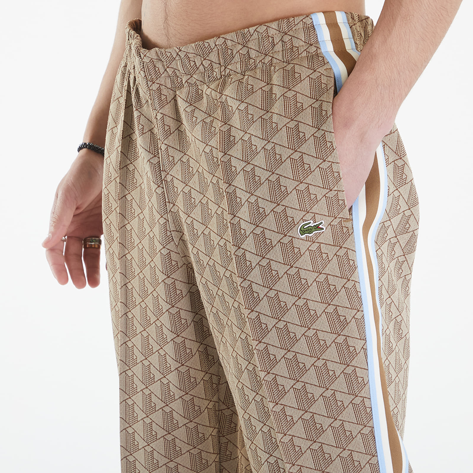 Kalhoty LACOSTE Paris Monogram Jaquard Track Pants Croissant/ Cookie