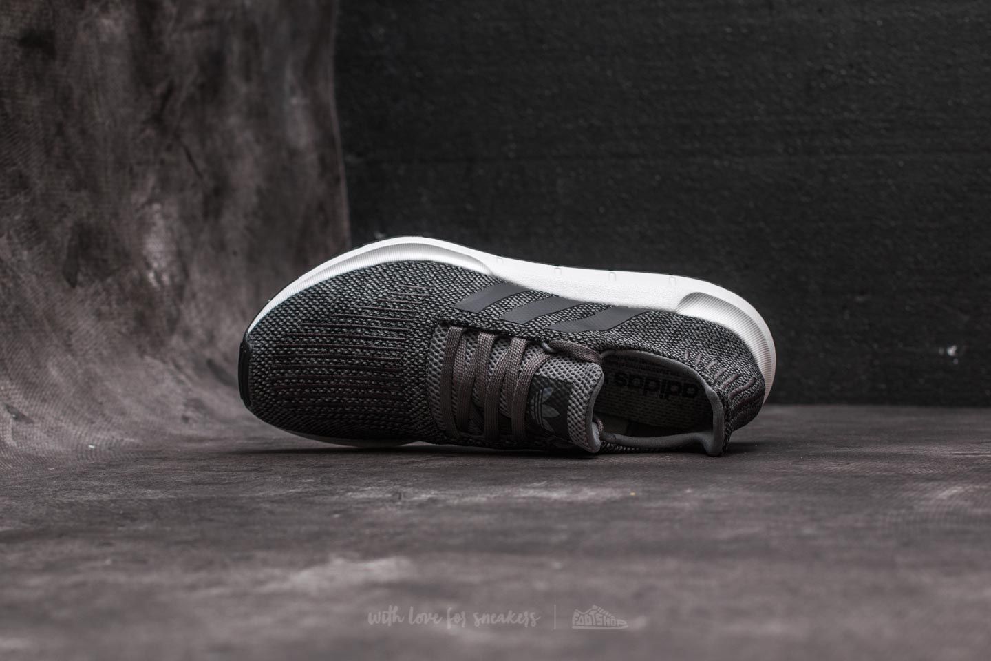 Core black adidas swift run top