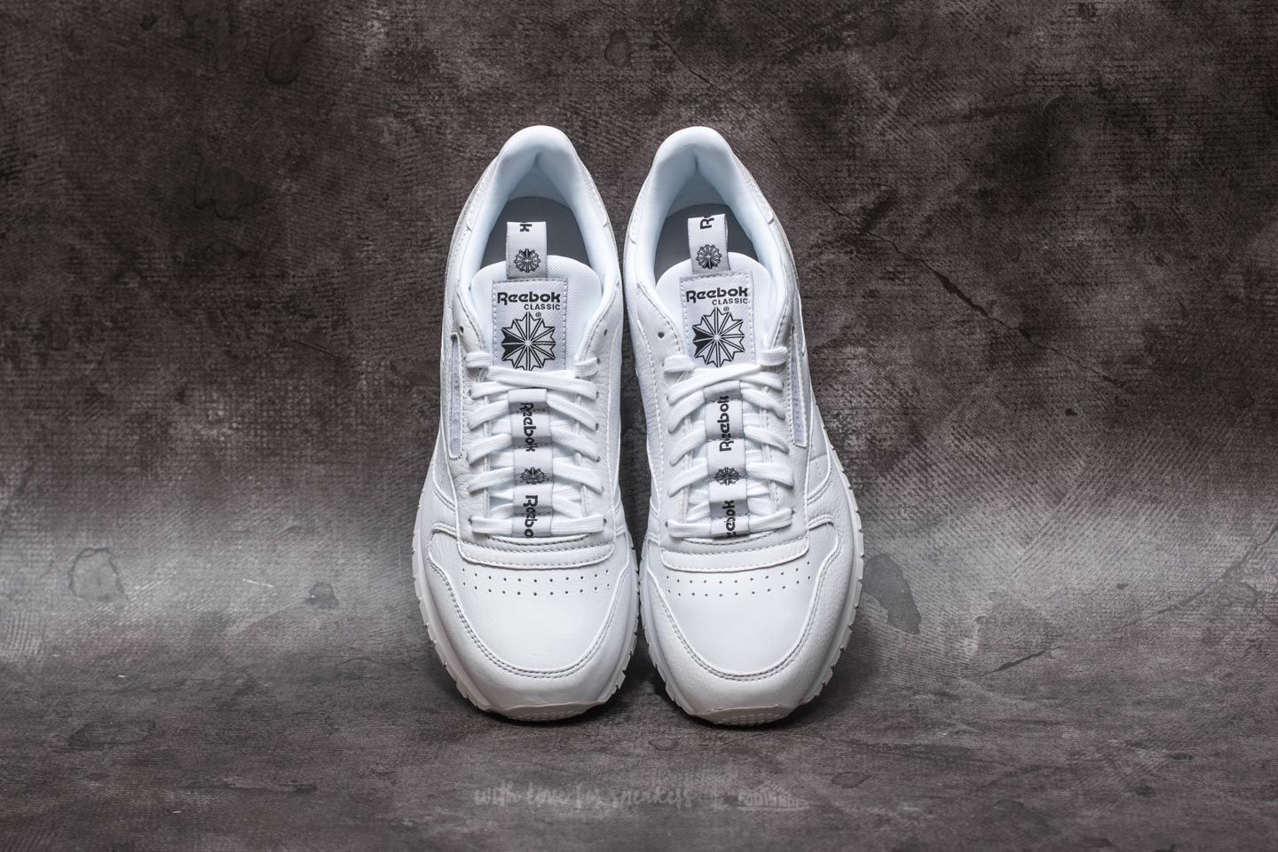 Scarpe reebok bianche e nere online
