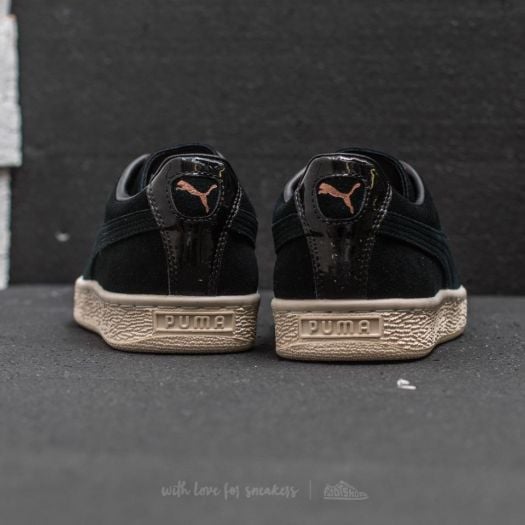 Black and gold pumas xl discount