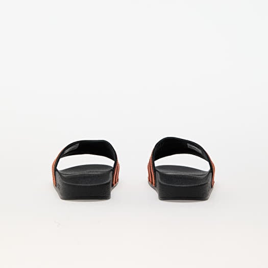 Orange and black adidas slides sales