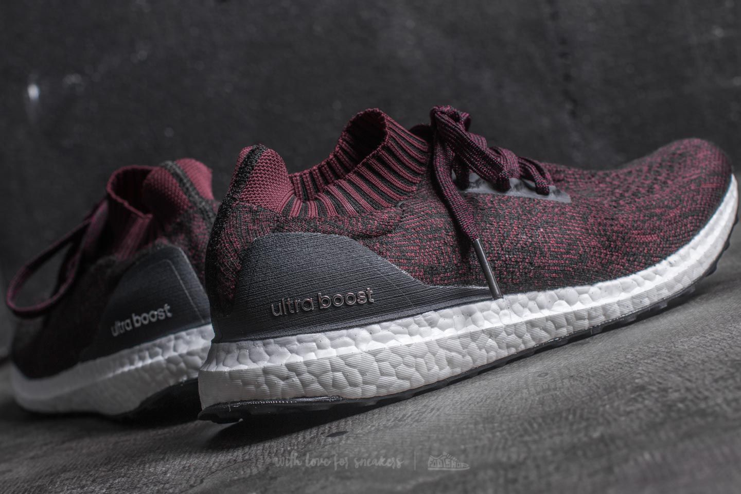 Ultra boost uncaged top core black active red
