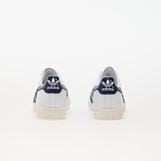 Adidas superstar white navy blue best sale
