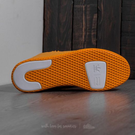 Pharrell williams 2025 shoes gold