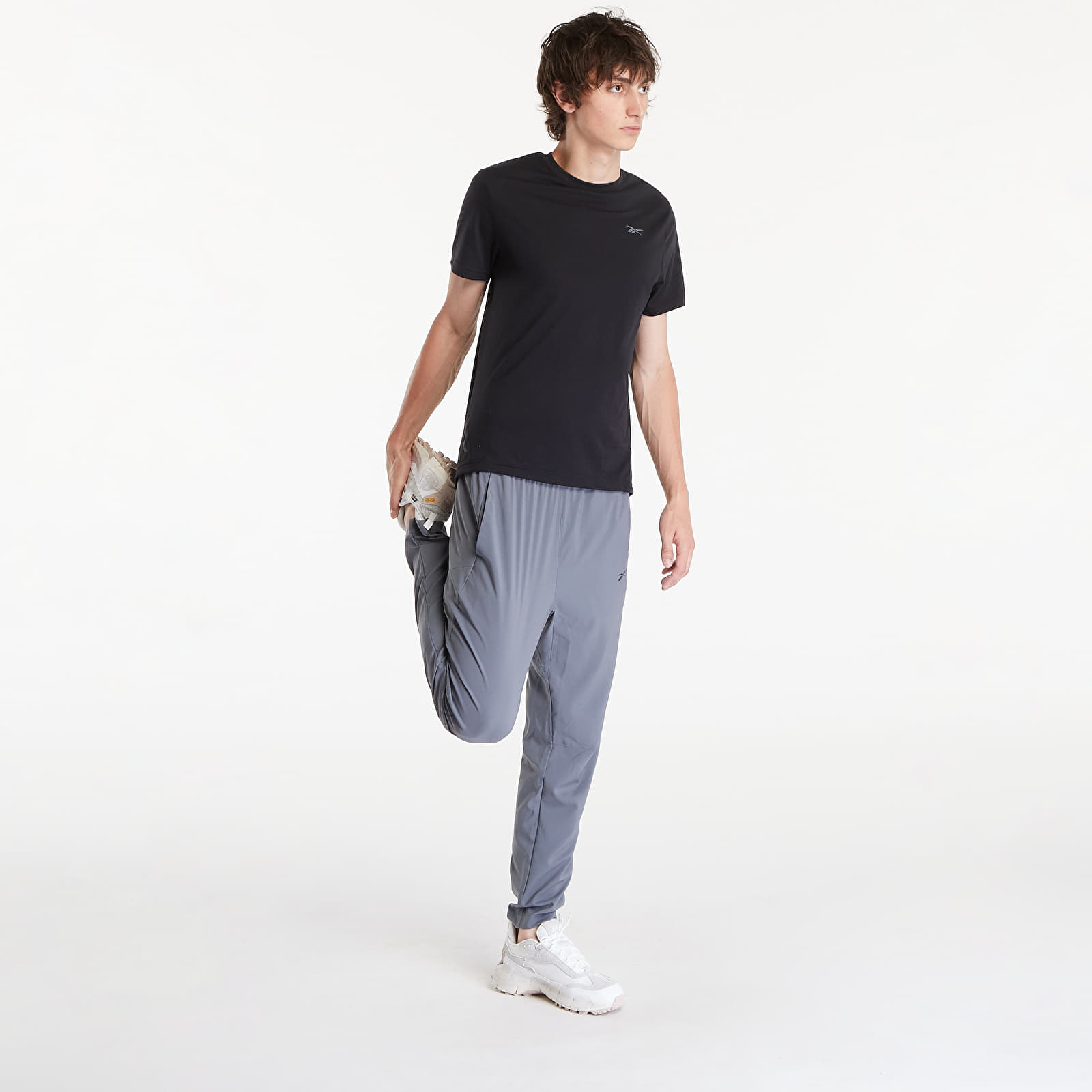 Pánské kalhoty Reebok Id Train Woven Pant Grey