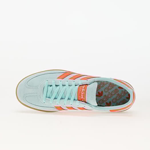 Aqua and orange sneakers store