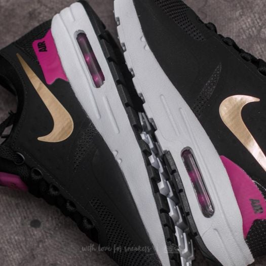 Women s shoes Nike Air Max Zero Essential GS Black Metallic Gold White Footshop
