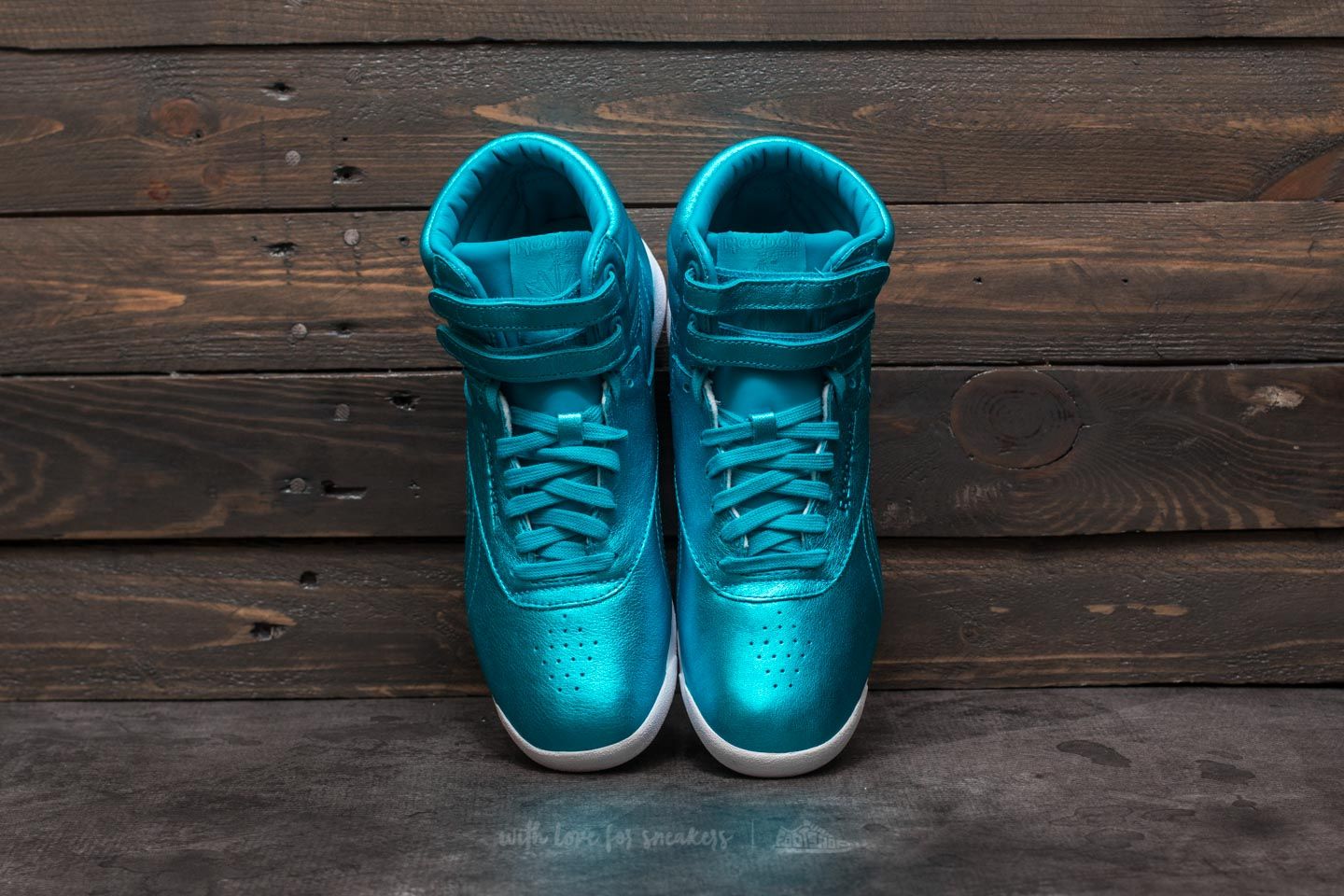 Reebok freestyle hi new arrivals metallic blue