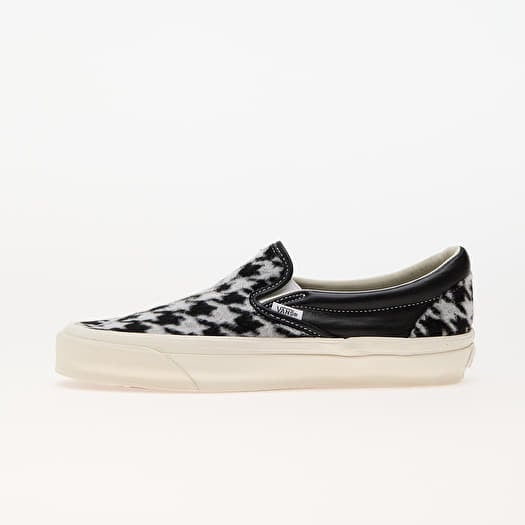 Black checkerboard vans slip on clearance