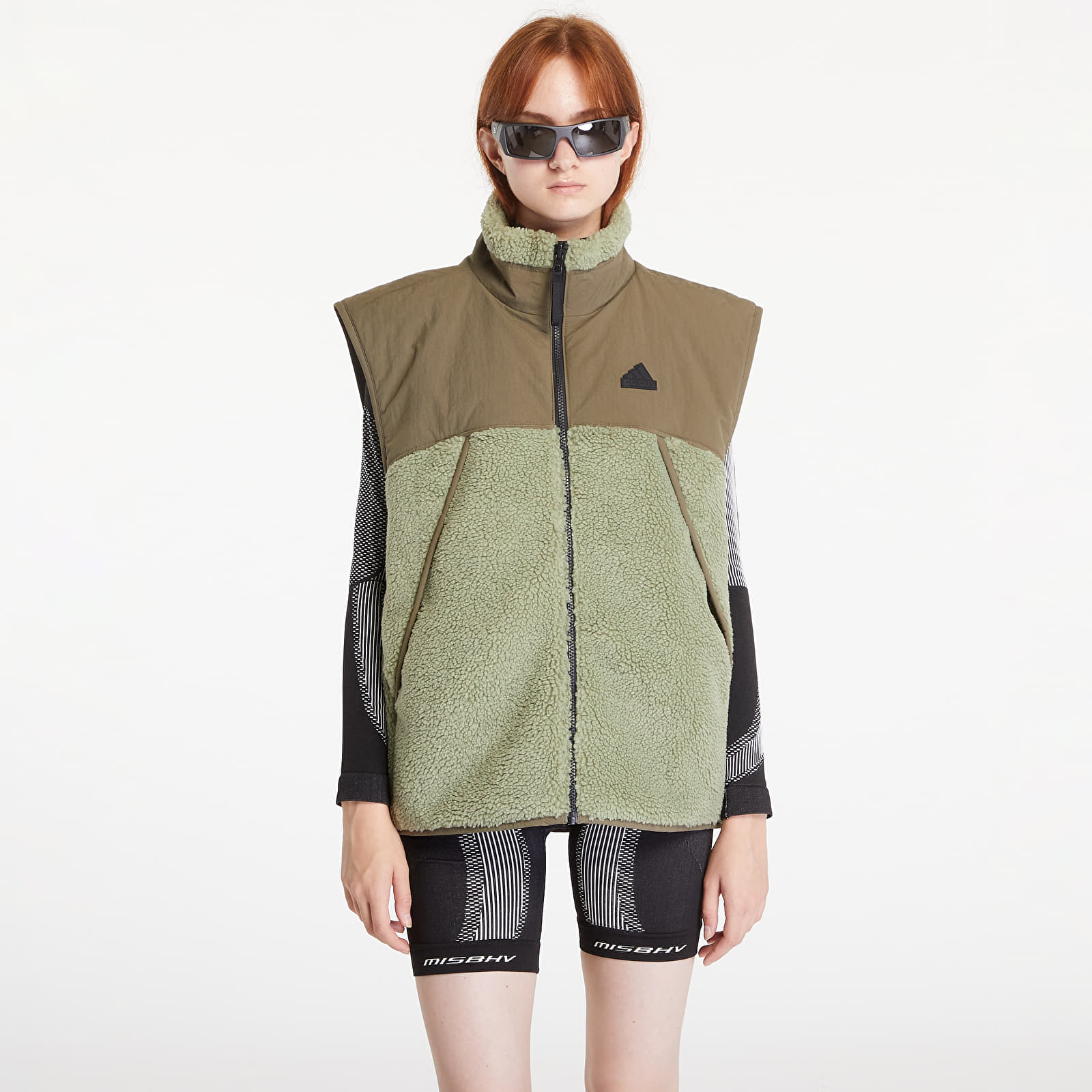 Vesty adidas City Escape Reversible Vest Tent Green / Olive Strata