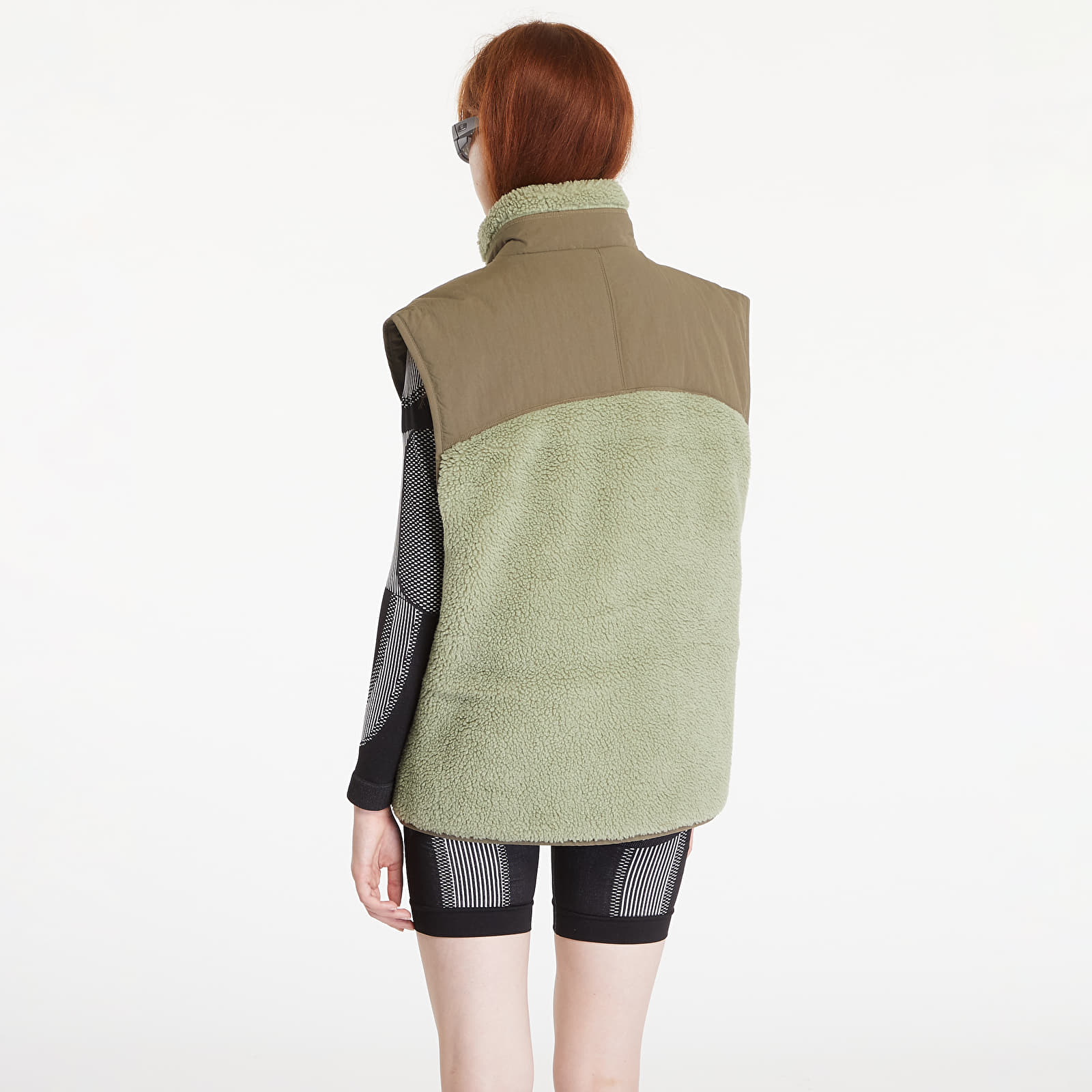 Vesty adidas City Escape Reversible Vest Tent Green / Olive Strata