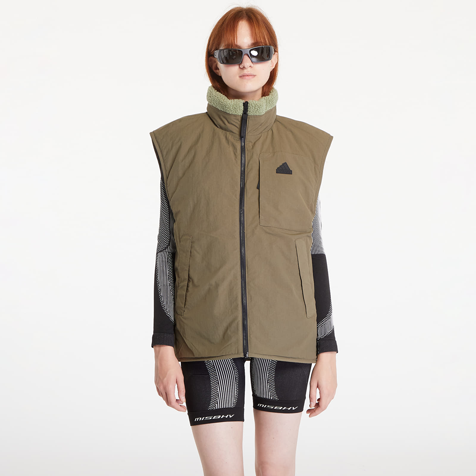Vesty adidas City Escape Reversible Vest Tent Green / Olive Strata