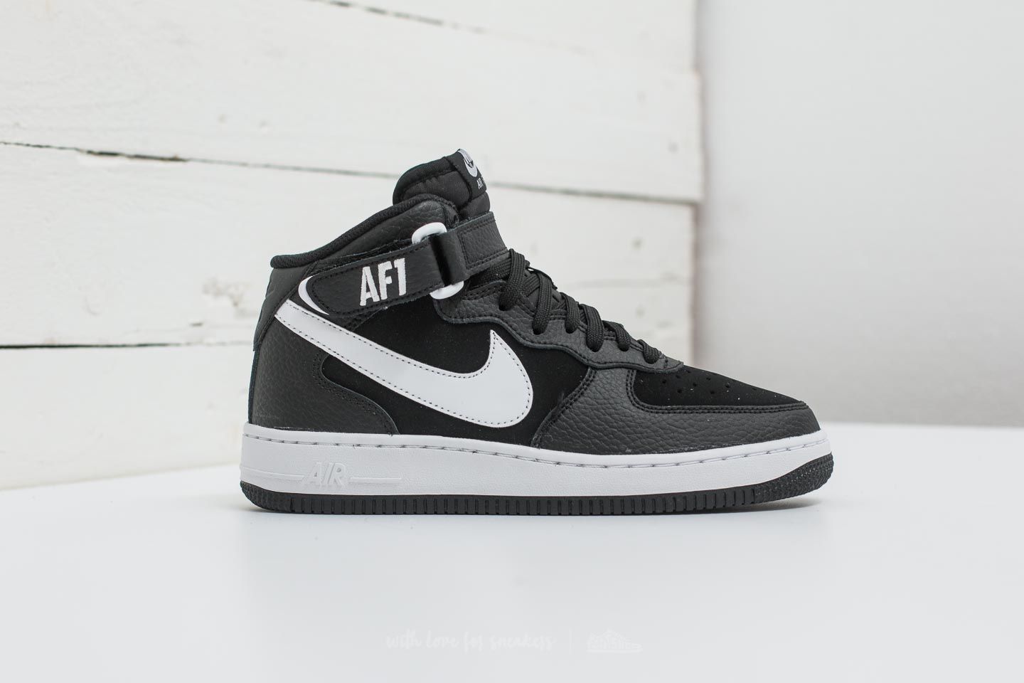 Women s shoes Nike Air Force 1 Mid GS Black White Footshop
