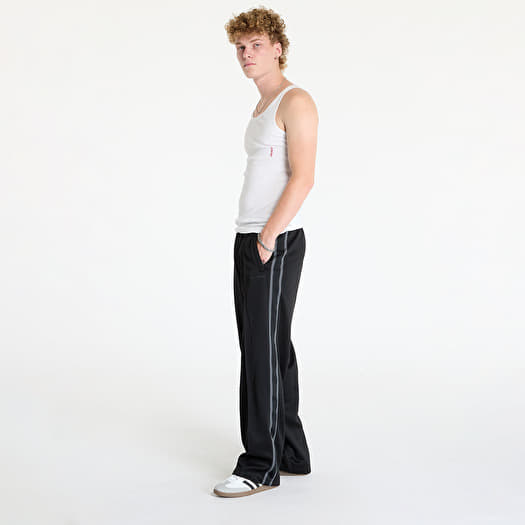 Pantalon survetement Carhartt WIP Bolan Sweat Pant Black Graphite Footshop